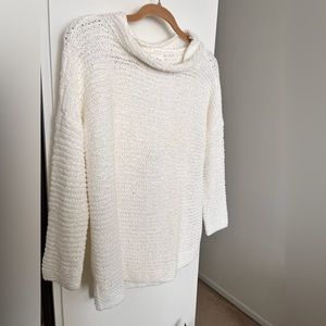 White loose turtleneck sweater